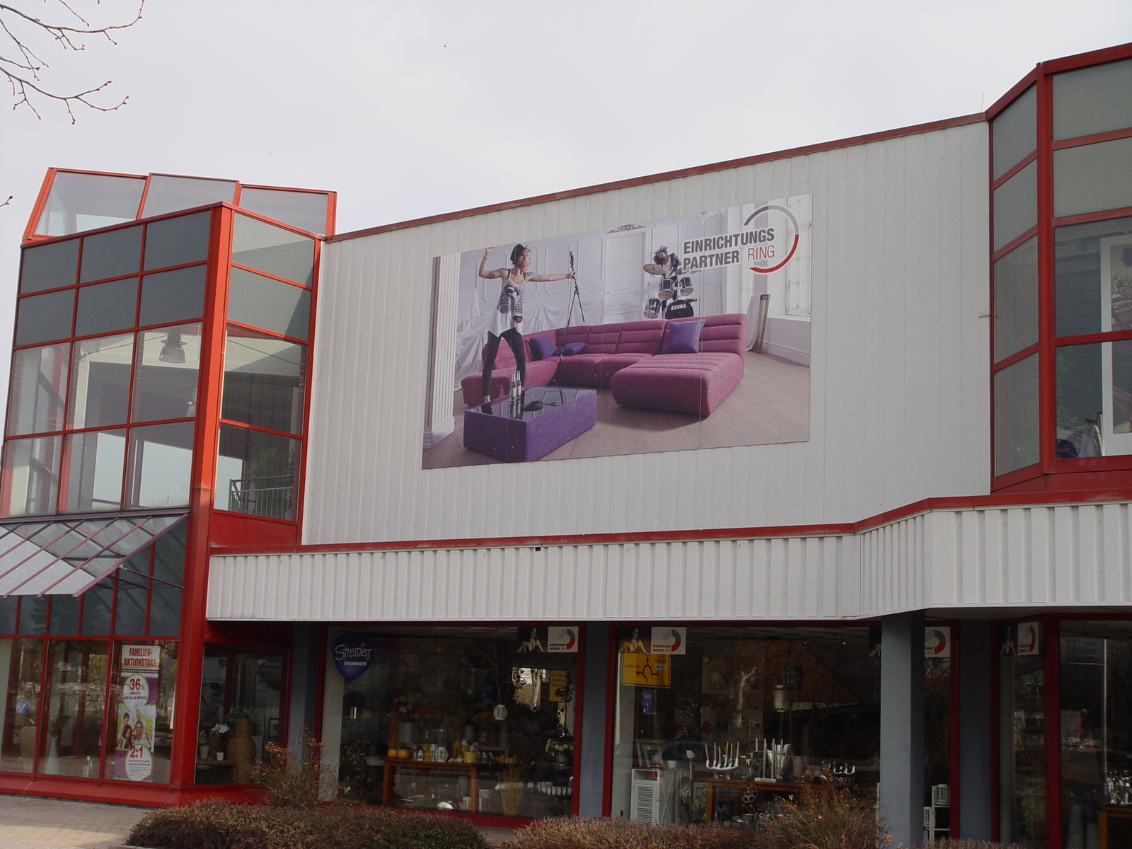 Fassadenschilder Aluverbund Digitaldruck Schüller Wohnzentrum 